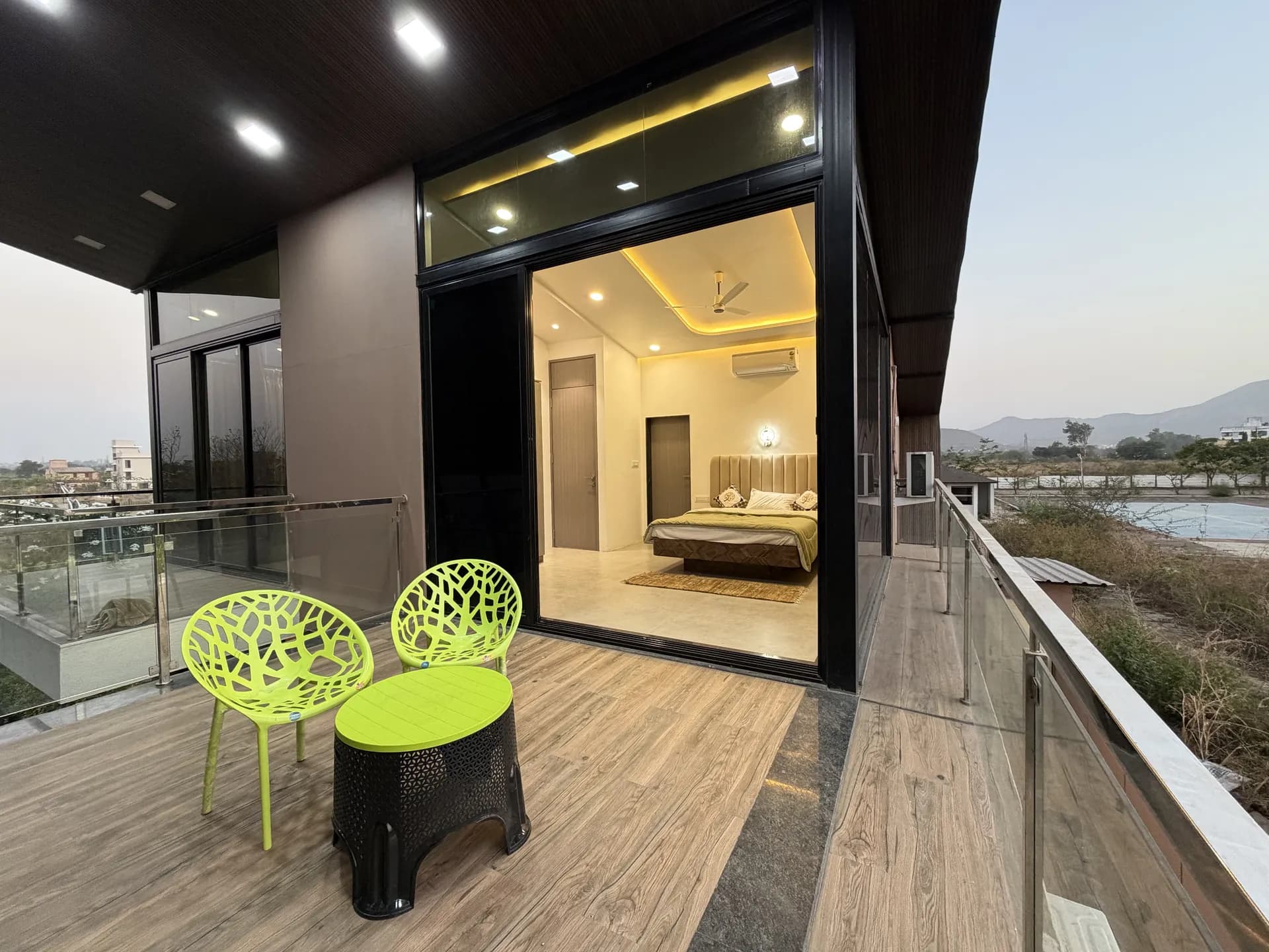 The Angle House Lonavala - Double Height Glass Living Hall for Milestone Celebrations
